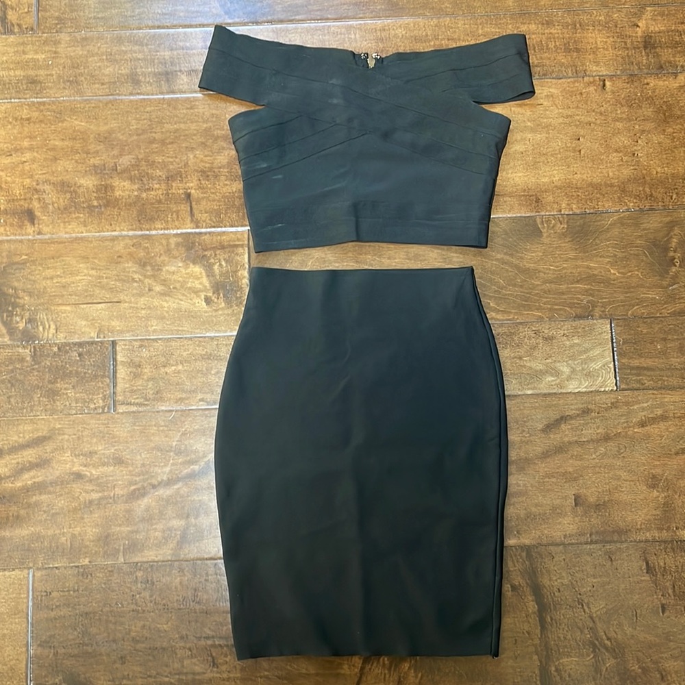 Black 2 piece top/skirt set.